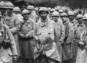 French soldiers in their distinct crested helmets being awarded the Military Medal, probably for their part in the Battle of the Somme