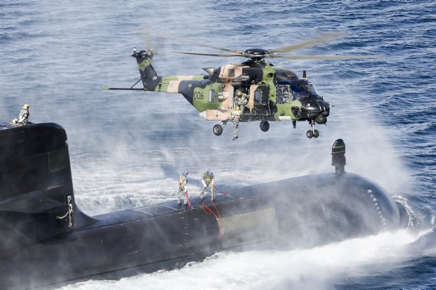 Australian Submarine and MRH-90 conduct personnel transfer