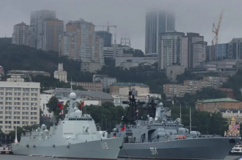 Article 2 Chinese destroyer Urumqi alongside the Russian destroyer Admiral Tributs in Vladivostok source PLA
