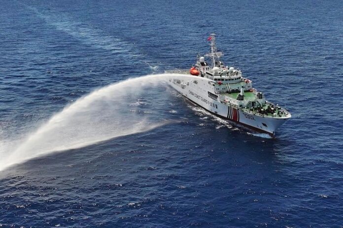 Article 4 Chinese Coast Guard vessel Chuanshan conducting water cannon training off the Scarborough Shoal on 5 May 2026 source Xinhua