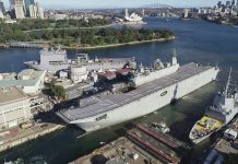 HMAS Canberra goes into docking
