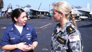 20091113ran852779501.JPG Photo By: LEUT Kelli Lunt Date Taken: 20091113   Caption: USS NIMITZ Operations E7 Maritza Chavez (left) explains operations on the USS NIMITZ flight deck to ABET Sam Whitfield from HMAS TOOWOOMBA during a personnel exchange programme. Personnel from both ships spent a day with their coalition counterparts swapping stories and learning from their hosts.   Mid Captions:  HMAS TOOWOOMBA is currently serving at sea on operations in the Middle East as part of Australia's military contribution to coalition efforts against international terrorism, countering piracy in the Gulf of Aden, and maritime security.