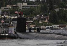 Damaged sub Connecticut arrives in US