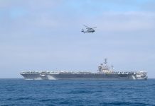 USS Nimitz heads to sea after quarantine