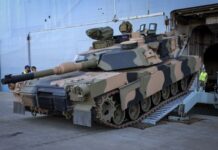 HMAS Adelaide does the heavy lifting