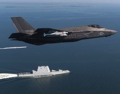Aircraft CF-02, an F-35 Lightning II Carrier Variant attached to the F-35 Pax River Integrated Test Force (ITF) assigned to Air Test and Evaluation Squadron (VX) 23 completes a flyover of the guided-missile destroyer USS Zumwalt (DDG-1000). US Navy Photo