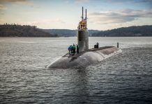 US submarine strikes object while submerged
