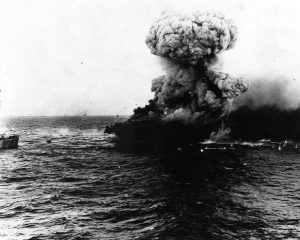 United States Navy aircraft carrier Lexington explodes on 8 May 1942, several hours after being damaged by a Japanese carrier air attack. 