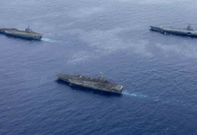 Massive munitions transfer at sea